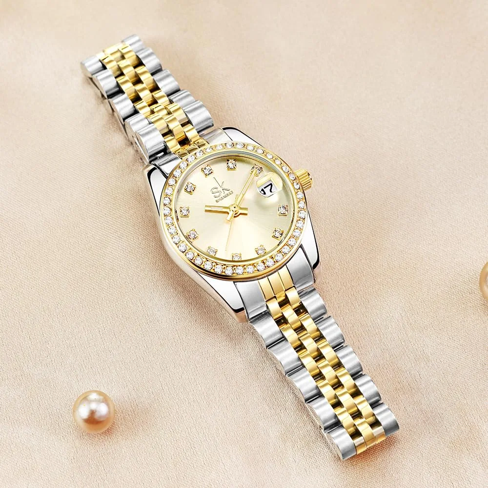 SHENGKE Orologio Donna al Quarzo con Cristalli e Calendario, Cinturino in Acciaio Solido (Argento-Oro), K0209L - immagine 5