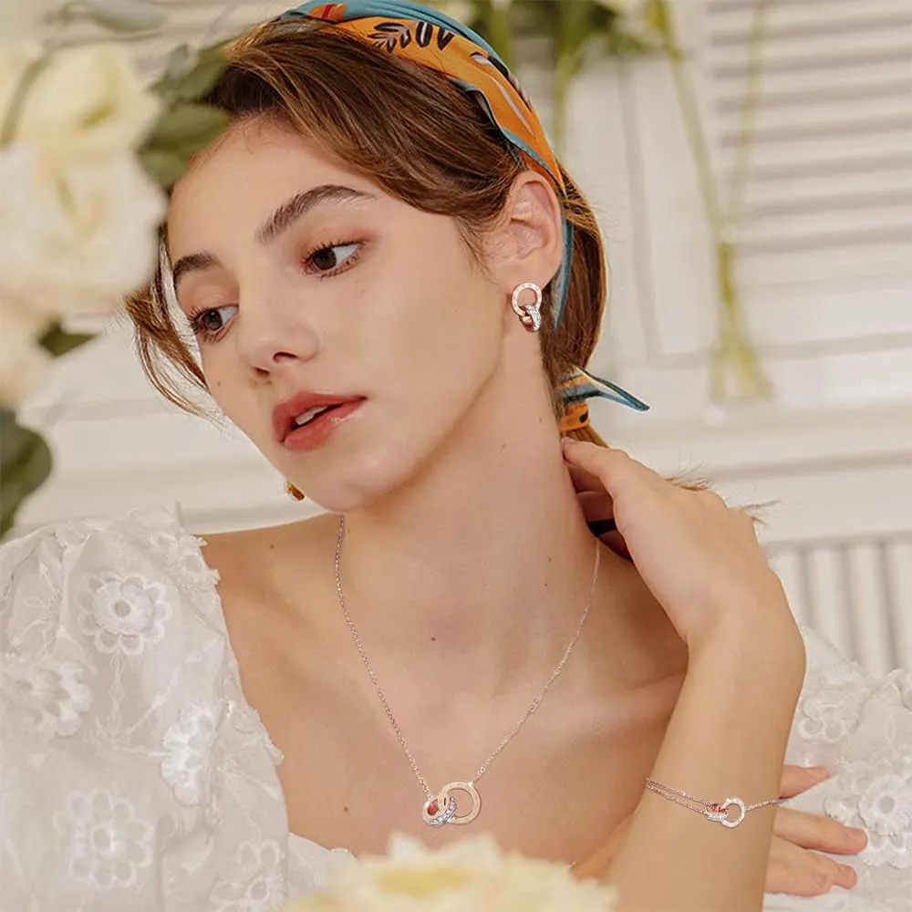 RPAEOY Set Gioielli Numeri Romani in Acciaio Inossidabile Placcato Oro 18K con Zircone, Collana, Orecchini e Bracciale (Oro Rosa) - immagine 6