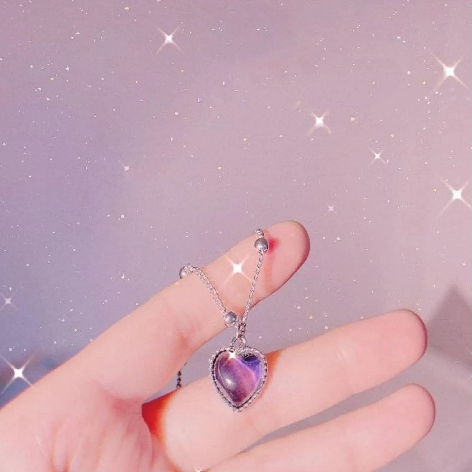 Collana termocromica con ciondolo a forma di cuore infinito che cambia colore - immagine 6