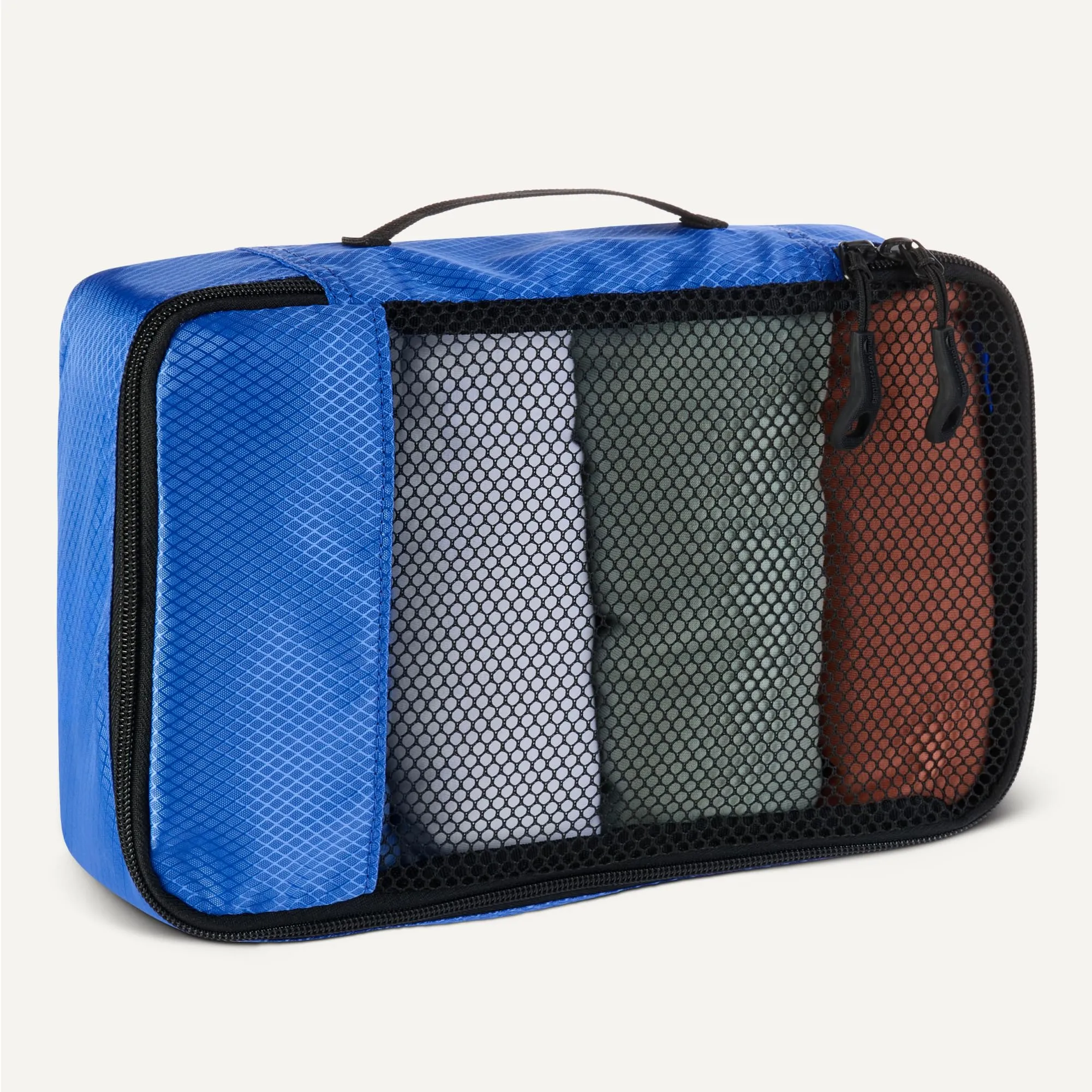 Amazon Essentials Set di 4 Packing Cube, Organizer per Bagagli S/M/L/Slim, Blu - immagine 4
