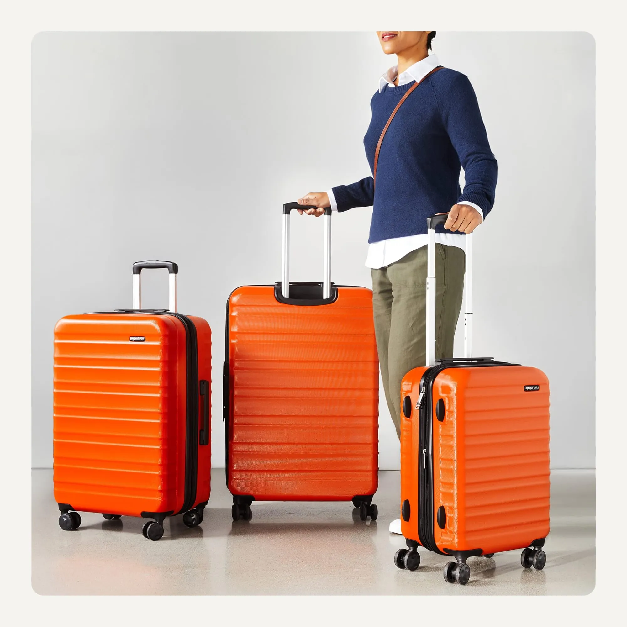 Amazon Basics Set Valigie Rigide ABS Espandibili (Piccola, Media, Grande) - Arancione Bruciato - immagine 3