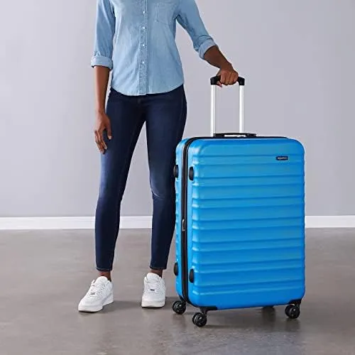 Amazon Basics Valigia Rigida Grande Espandibile in ABS, 78 x 52,6 x 32 cm, Azzurro - immagine 6
