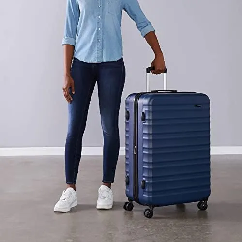 Amazon Basics Valigia Rigida Grande Espandibile in ABS, 78 x 52,6 x 32 cm, Blu Navy - immagine 6