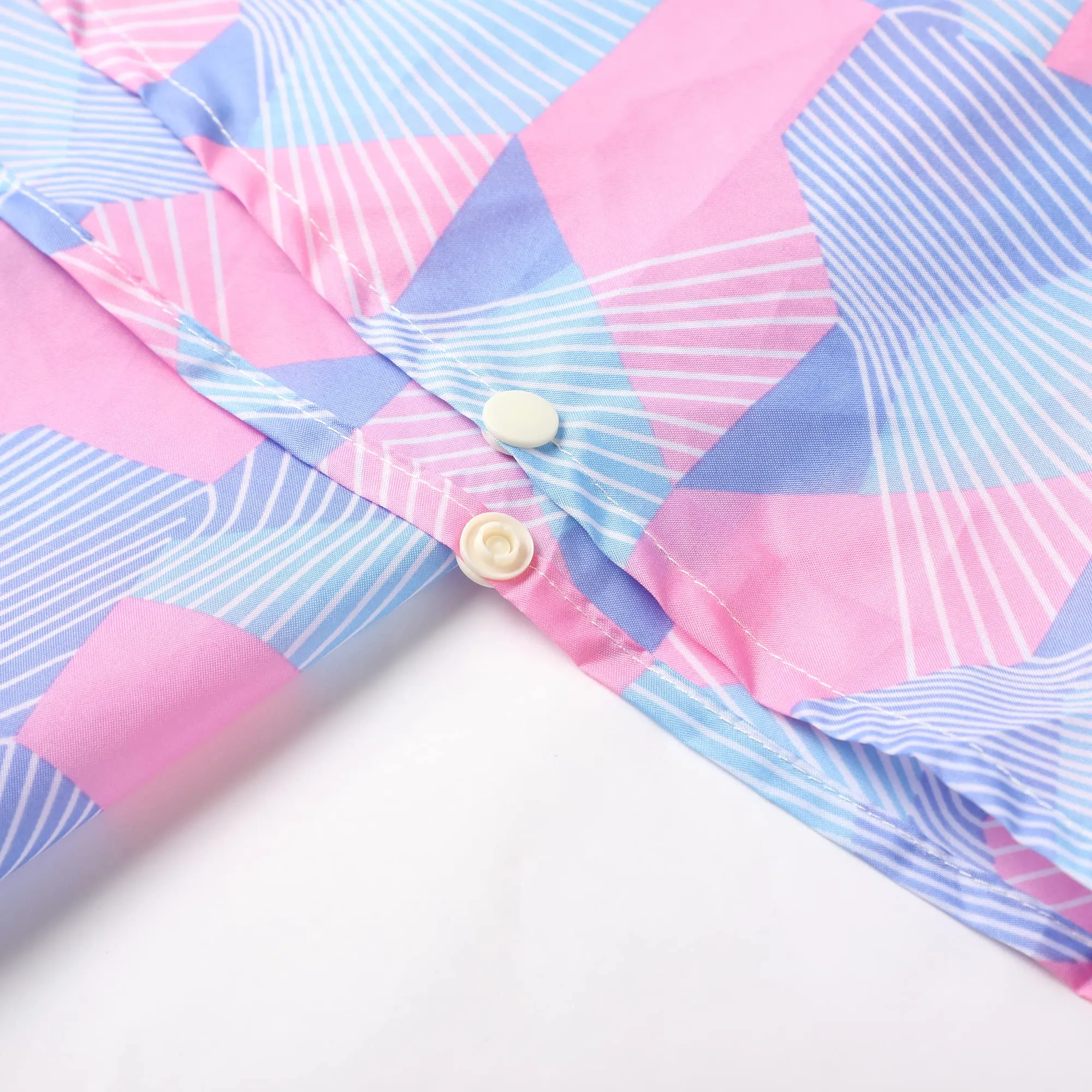 QIKADO Poncho Impermeabile per Bambini con Cappuccio e Custodia Tascabile, Rosa geometrico, XL - immagine 4