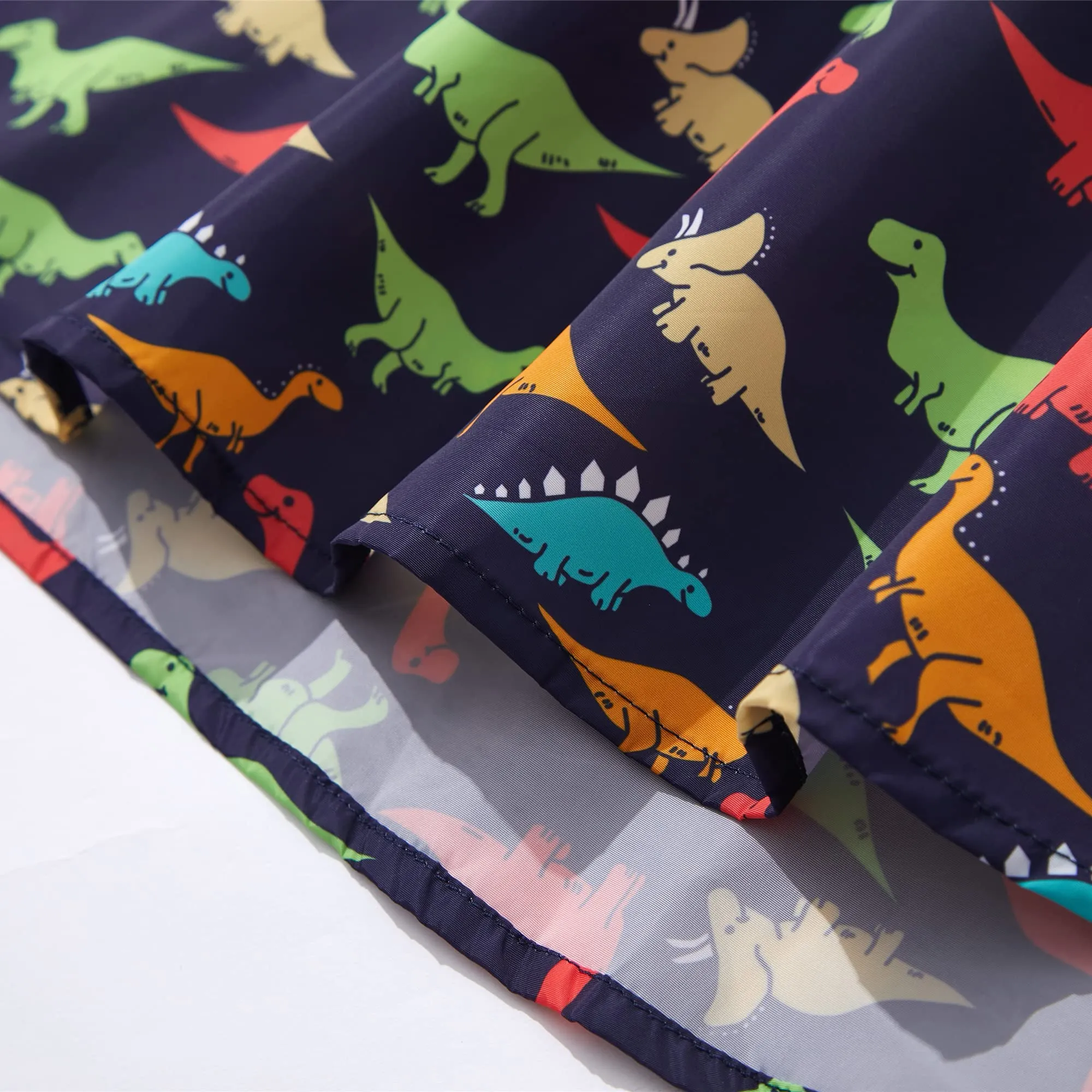 QIKADO Poncho Antipioggia Bambino con Cappuccio Dinosauro multicolore, 5-8 anni - immagine 5