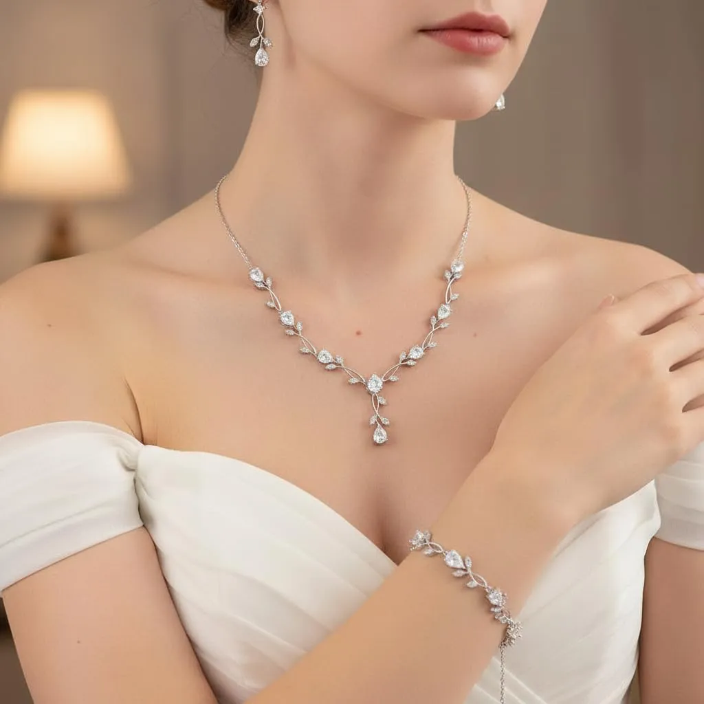 EVER FAITH Set di gioielli da sposa in Cubic Zirconia a forma di goccia e foglia di vite, collana, orecchini e bracciale - immagine 2