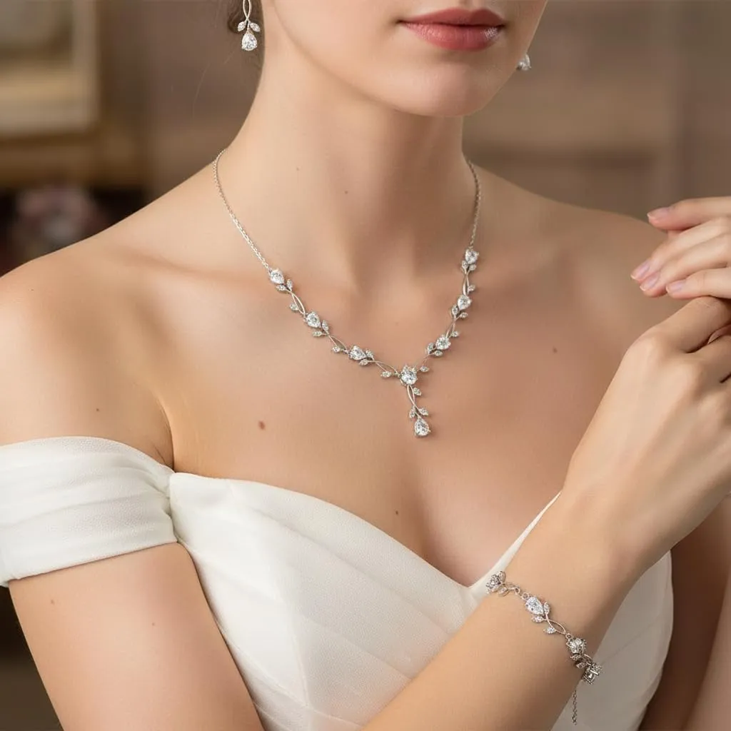 EVER FAITH Set di gioielli da sposa in Cubic Zirconia a forma di goccia e foglia di vite, collana, orecchini e bracciale - immagine 3