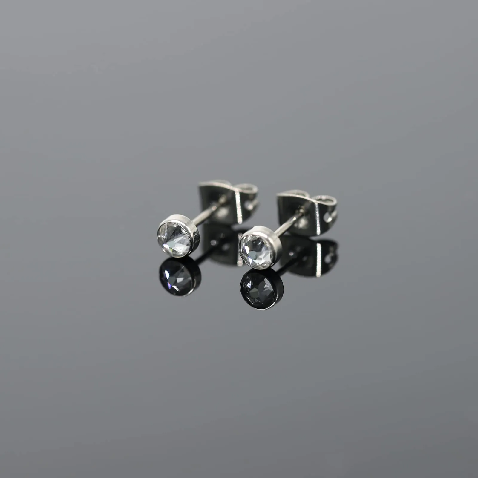 Artskin Orecchini a bottone in titanio G23 con zirconi ipoallergenici, 7 mm - immagine 6