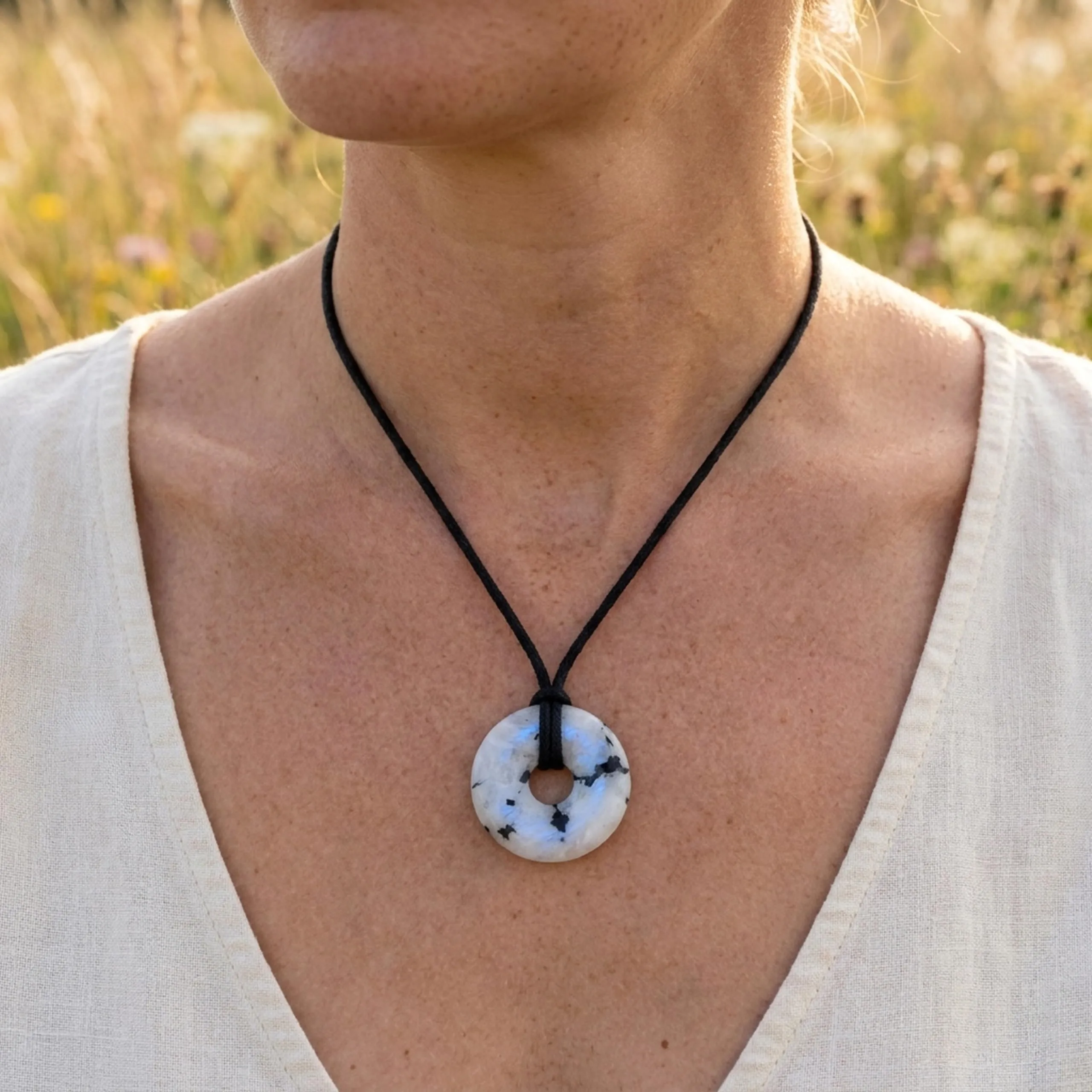 Lebensquelle Plus Rainbow Moonstone Donut Necklace 30 mm with Cotton Cord and Information Card - immagine 2