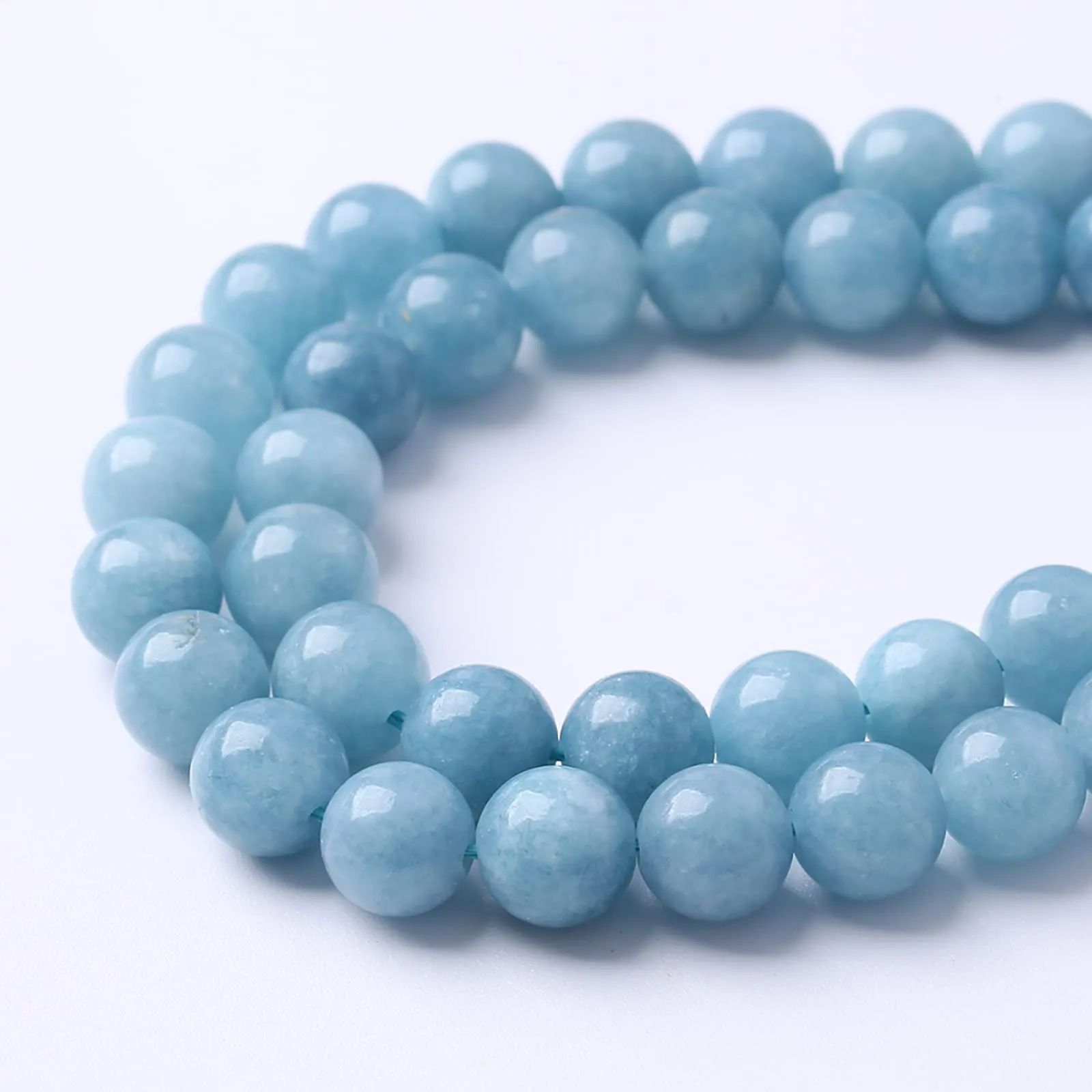LOSKOSSLTDD1 Perline in Giada Acquamarina Blu, 6 mm, 120 Pezzi (2 Fili) - immagine 4