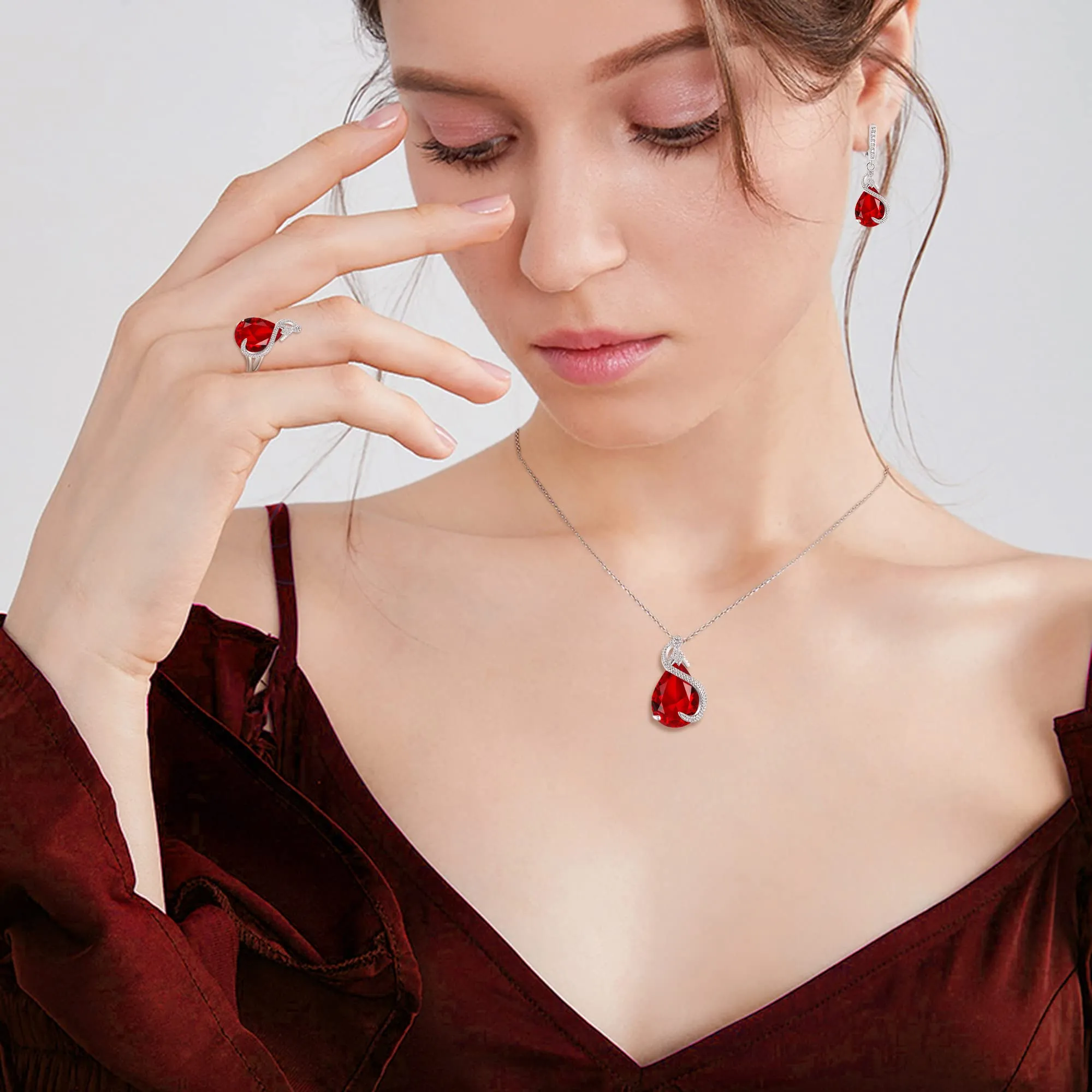 EVER FAITH Bridal Goccia Zirconia cubica Set di gioielli per la sposa damigella d'onore, Rubino Birthstone Pendant Necklace Earrings Tennis Bracciale Aperto Ring for Women Rosso Argento fondo - immagine 5