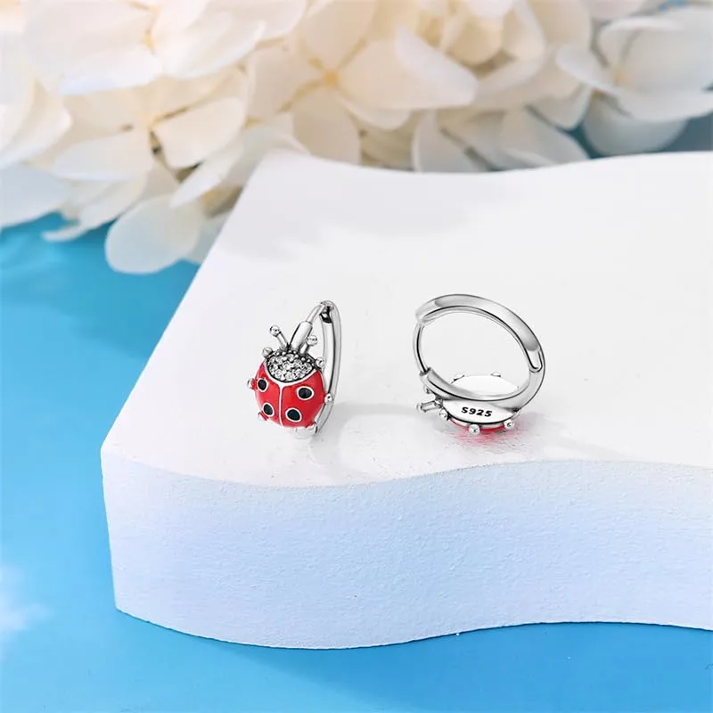 QIKAOLA S925 Orecchini in argento da donna Orecchini a cerchio ipoallergenici Orecchini Huggie con zirconia cubica - immagine 5