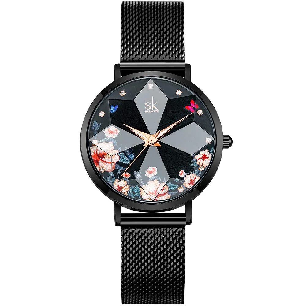 SHENGKE Orologio stellato Orologio Analogico Classico Quarzo da Donna con Cinturino in Acciaio Inox(Flower-Mesh Band-Black) - immagine 1