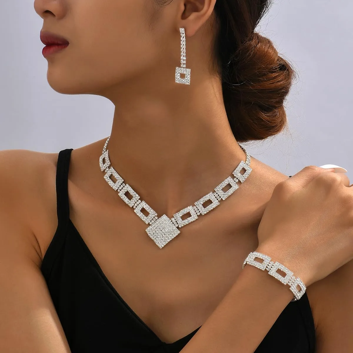 XFSRG Set di Gioielli Donna 3 Pezzi Parure Collana Orecchini e Bracciale Strass Scintillanti Argento Regolabili per Matrimonio e Serate Eleganti (Argento) - immagine 5