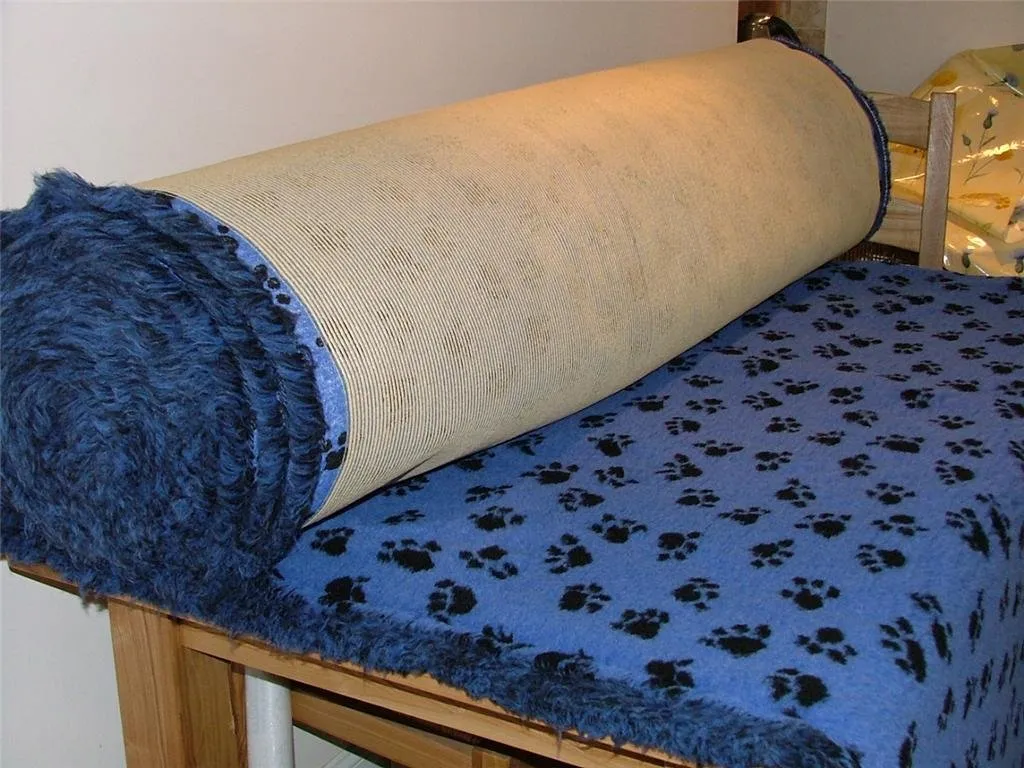 Profleece Non Slip Vet Bedding Originale 100 x 75 cm Tappeto per Cani e Gatti Incontinenti, Anziani, Malati Termoisolante, Filtra i Liquidi, Mantiene il Pelo Asciutto. (Azzurro Zampe Nere) - immagine 5