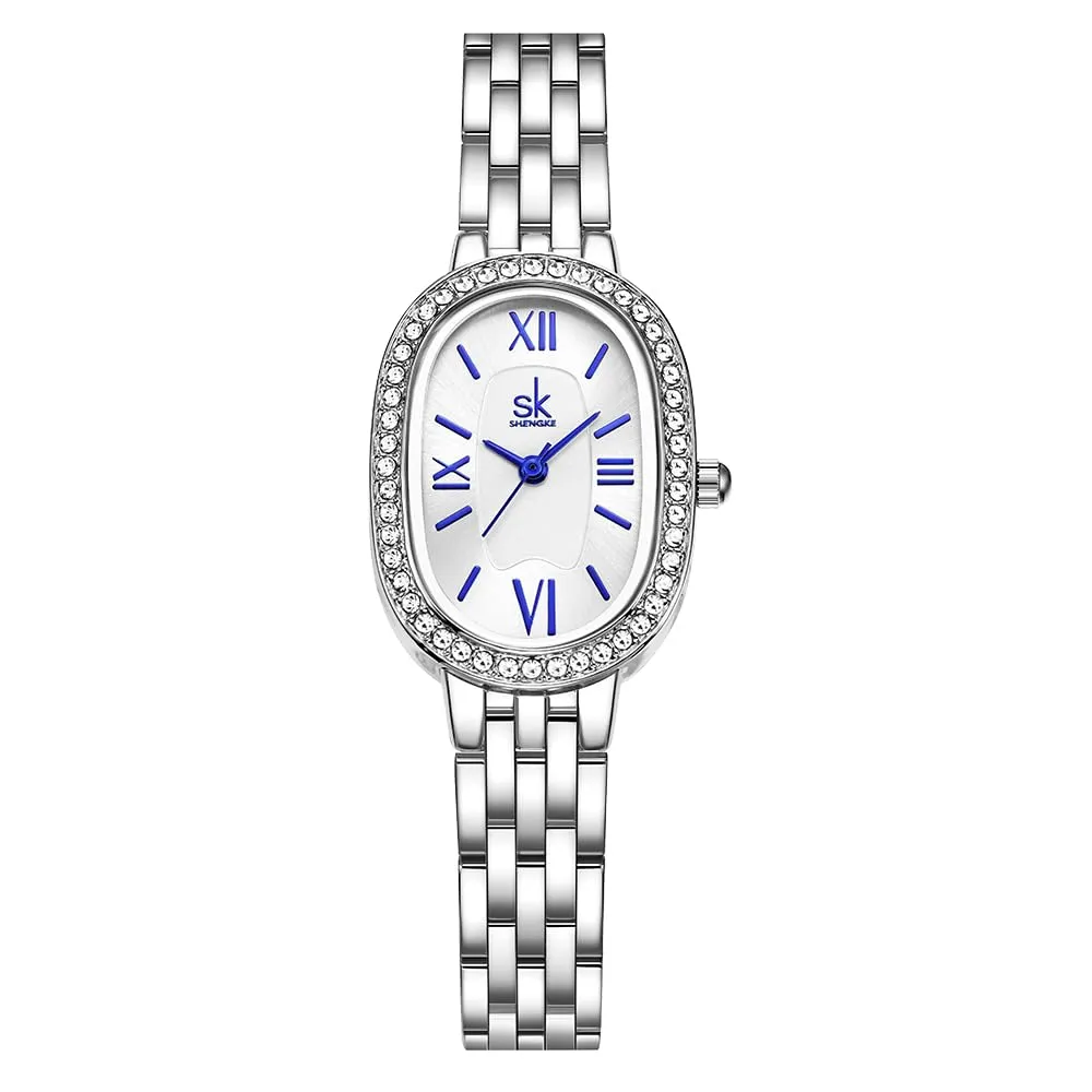 SHENGKE SK Orologio da donna con bracciale in acciaio massiccio a forma di ovale e accessoriato con cristalli (Argento-Blu) - immagine 1