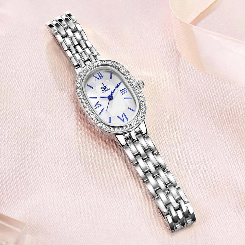 SHENGKE SK Orologio da donna con bracciale in acciaio massiccio a forma di ovale e accessoriato con cristalli (Argento-Blu) - immagine 7