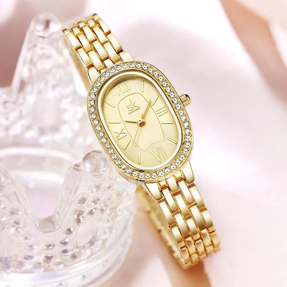 SHENGKE SK Orologio da donna con bracciale in acciaio massiccio a forma di ovale e accessoriato con cristalli (Oro) - immagine 3
