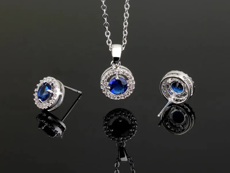 Crystalline Azuria Donna 18ct Placcato Oro Bianco Rotondo Zaffiro simulato Blu Cristalli di Zirconi Parure Collana con Ciondolo Orecchini Bracciale - immagine 4