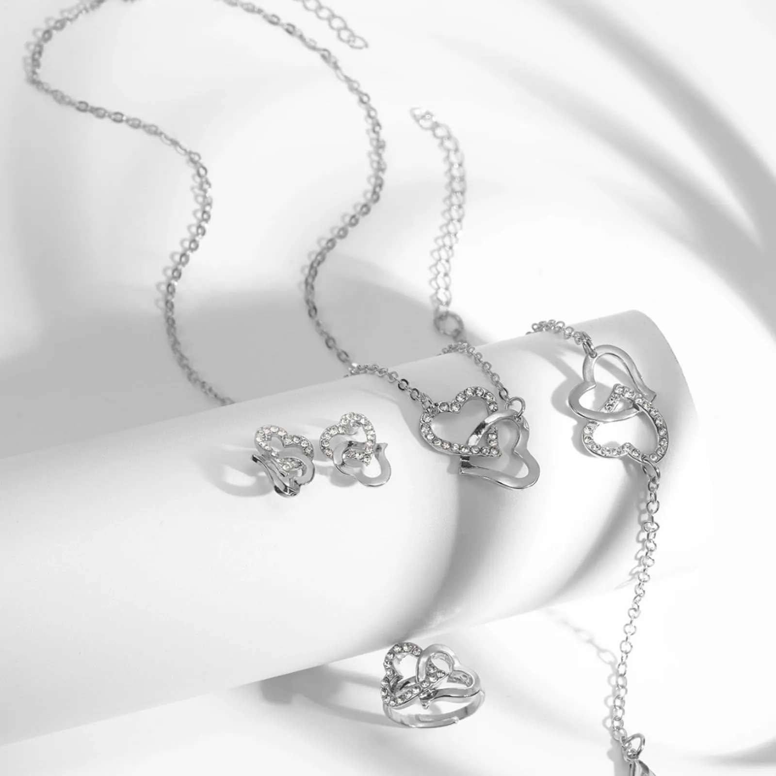 Bcenoilua Parure Gioielli per Donna Ragazze Acciaio Inossidabile Placcato Oro Collana Orecchini Bracciali Anello Parure in Argento con Strass Cuore Pendente Set di Gioielli (Argento, Taglia unica) - immagine 3