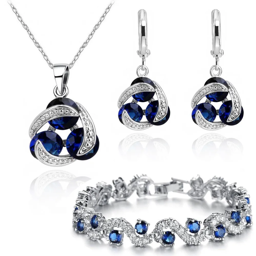 Crystalline Azuria Donna 18ct Placcato Oro Bianco Zaffiro simulato Blu Cristalli di Zirconi Parure Collana con Ciondolo 45 cm Orecchini Bracciale - immagine 1