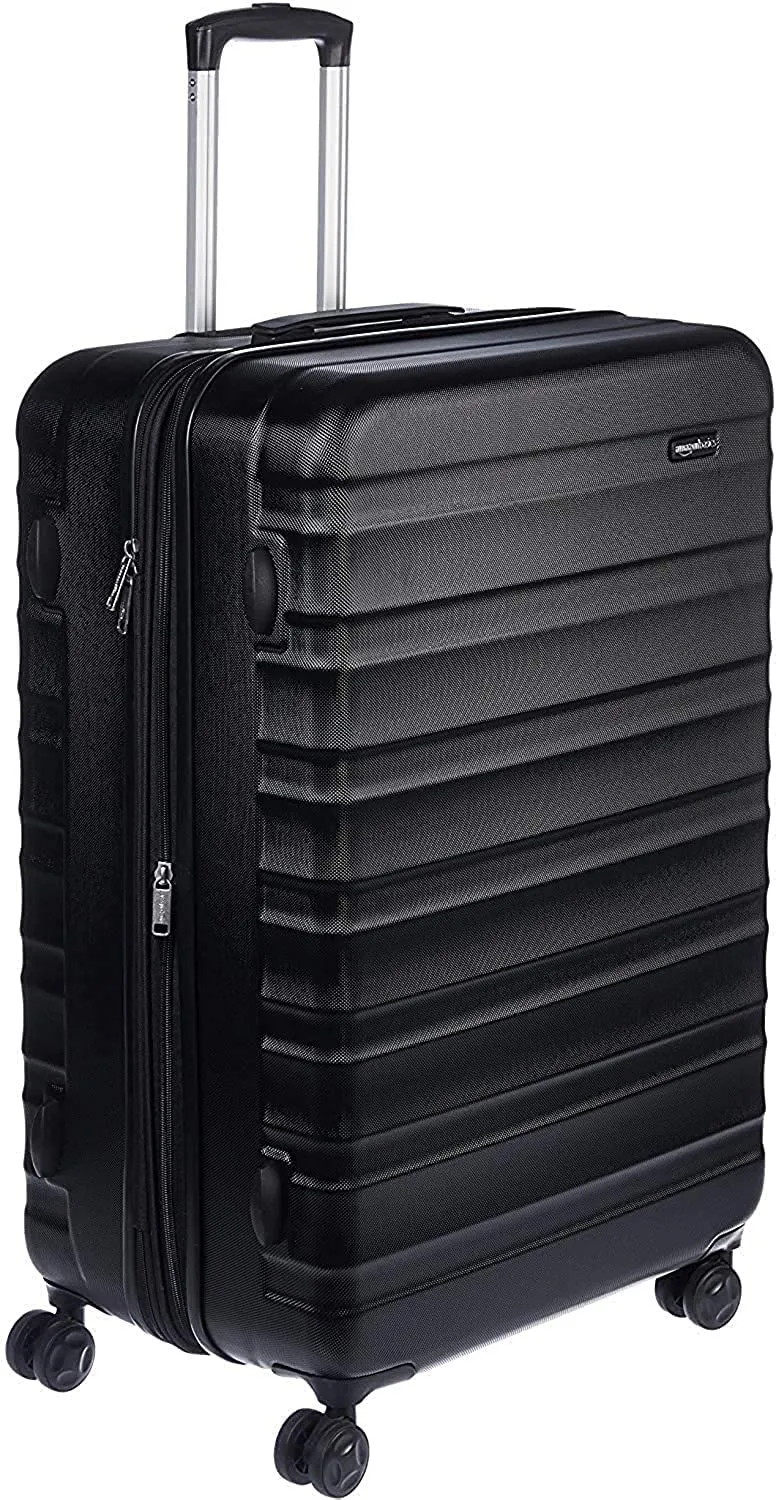 Amazon Basics Valigia Rigida Grande - Bagaglio Espandibile ABS con 4 Ruote Doppie Girevoli - Resistente ai Graffi e Leggera - 78 x 52,6 x 32cm - Nero